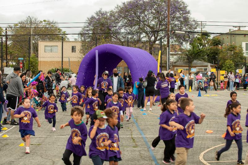 Bubbles filling the air over runners